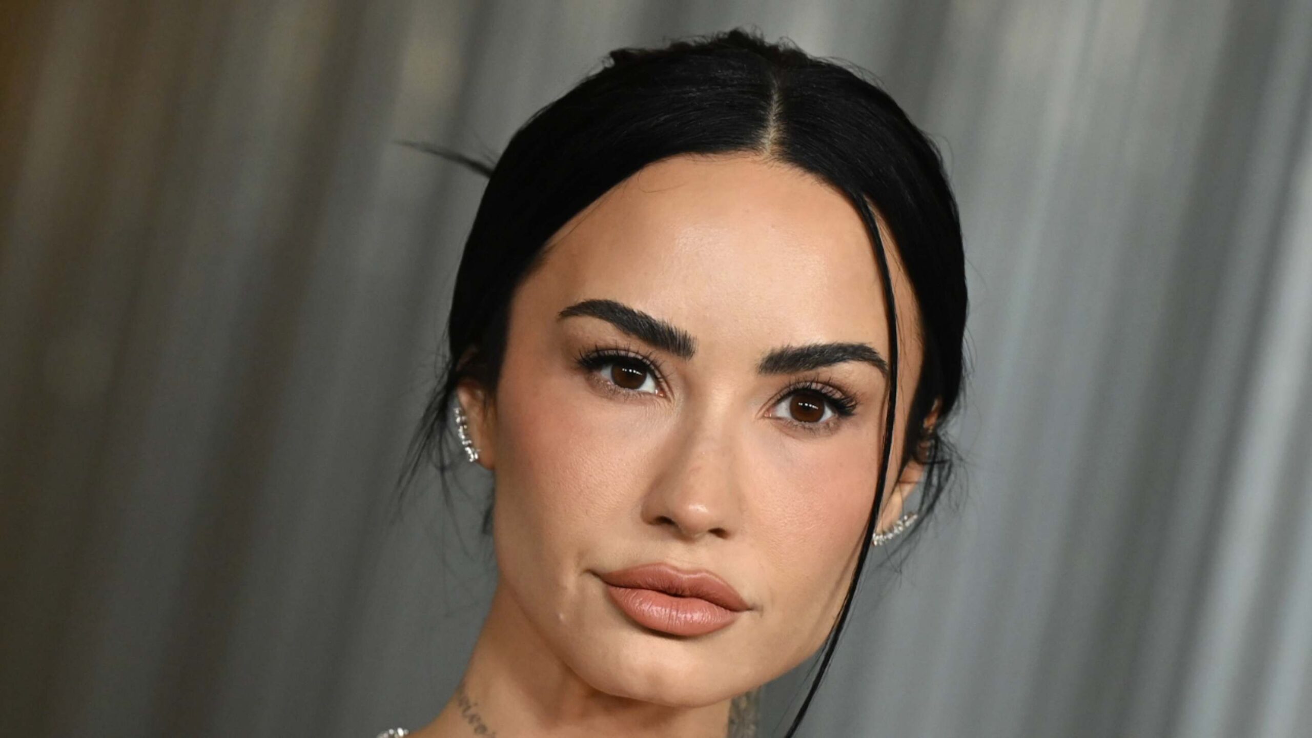 Demi Lovato’s Enviable Vacation Style Is Both Romantic and Retro-Inspired