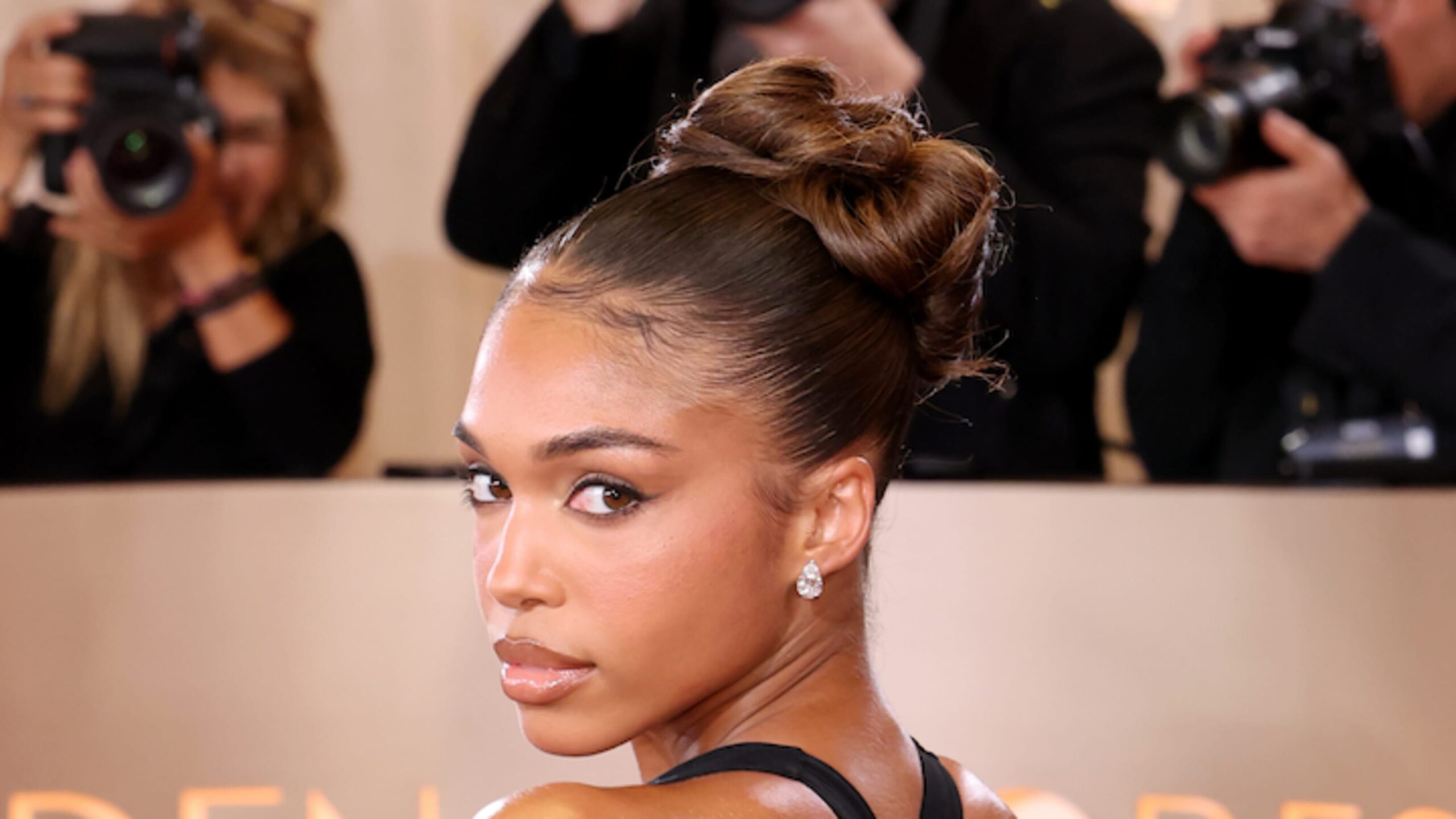 Lori Harvey Proves the Best Way to Elevate a Swimsuit Is With This Accessory Combo