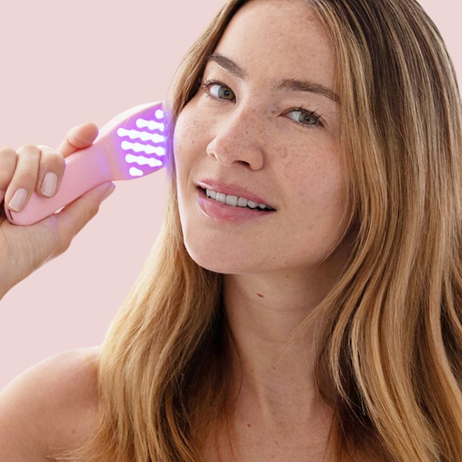 The Secret To Healthier Hair Might Be Brushing With LED Lights