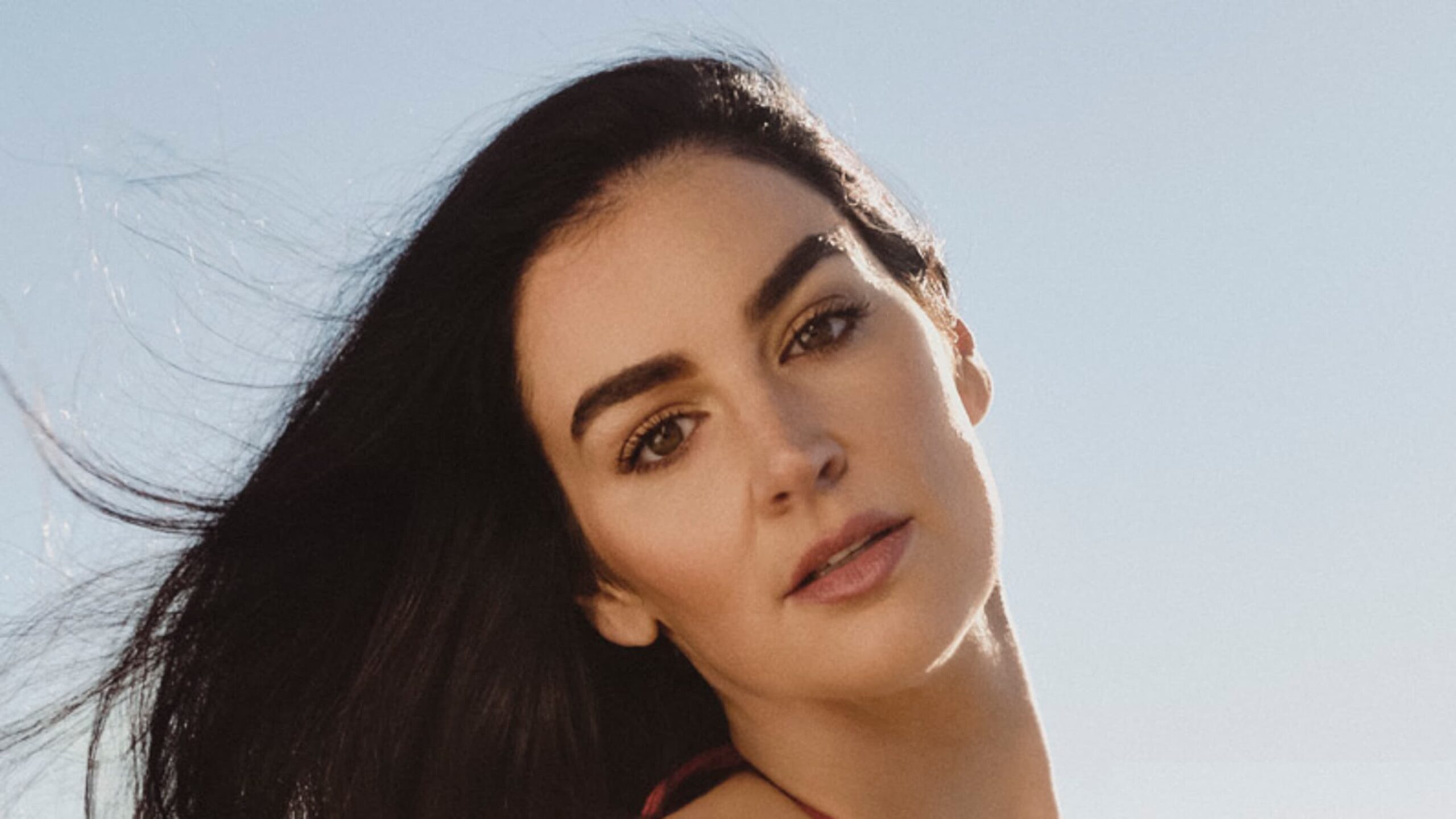 Shop Claire Kittle’s Cherry Red String Bikini From Her SI Swimsuit Digital Cover