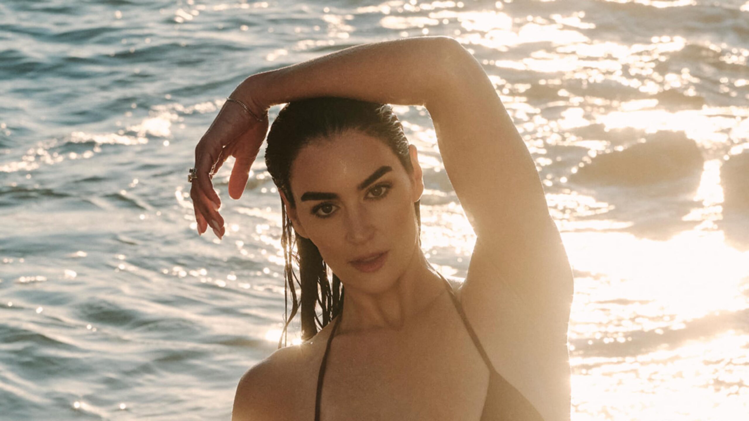 Shop the Asymmetrical Black One-Piece That’s Approved by Claire Kittle