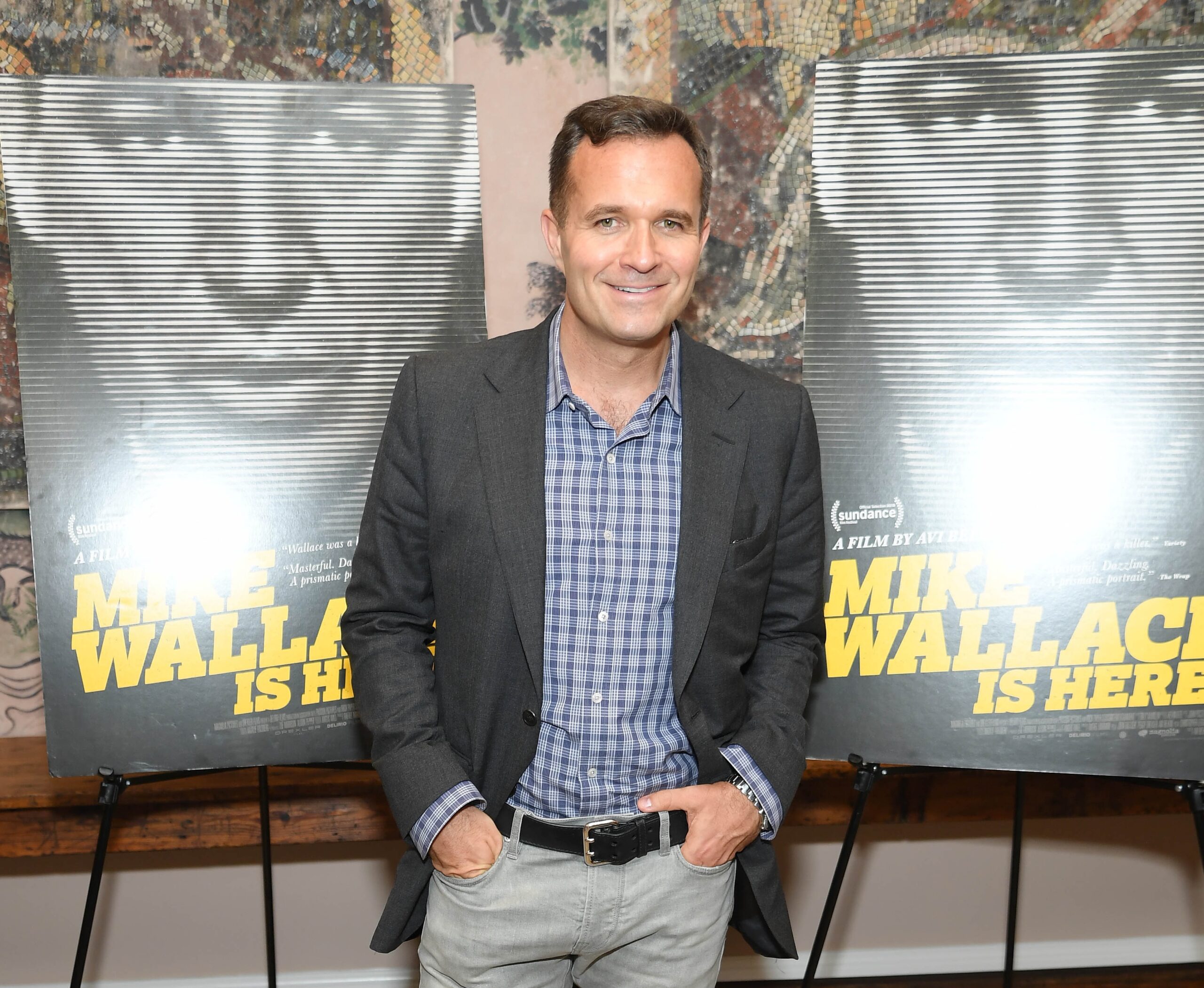 Newsmax Renews Shows Hosted by Greg Kelly, Carl Higbie