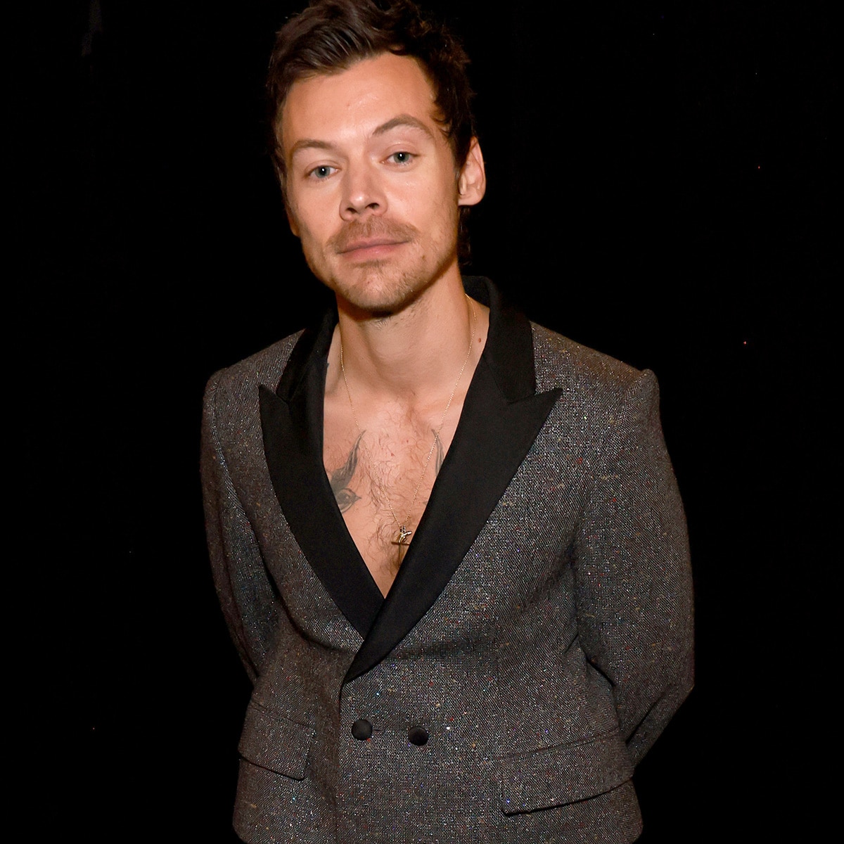 Harry Styles Makes Cheeky Comment About Hair Transplant Rumors