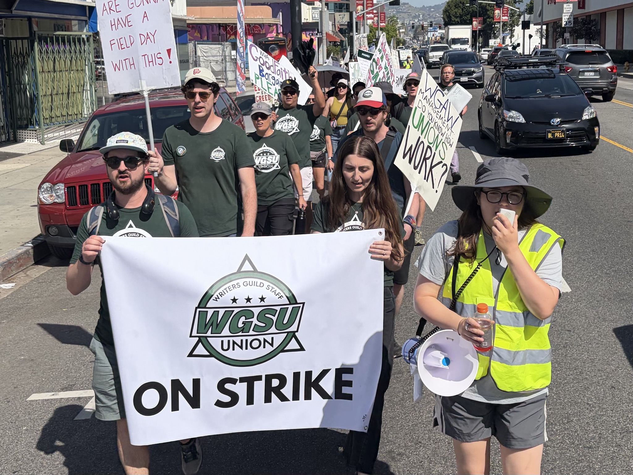 Striking Writers Guild Staffers Picket Outside Building Where Union Is Negotiating With Studios